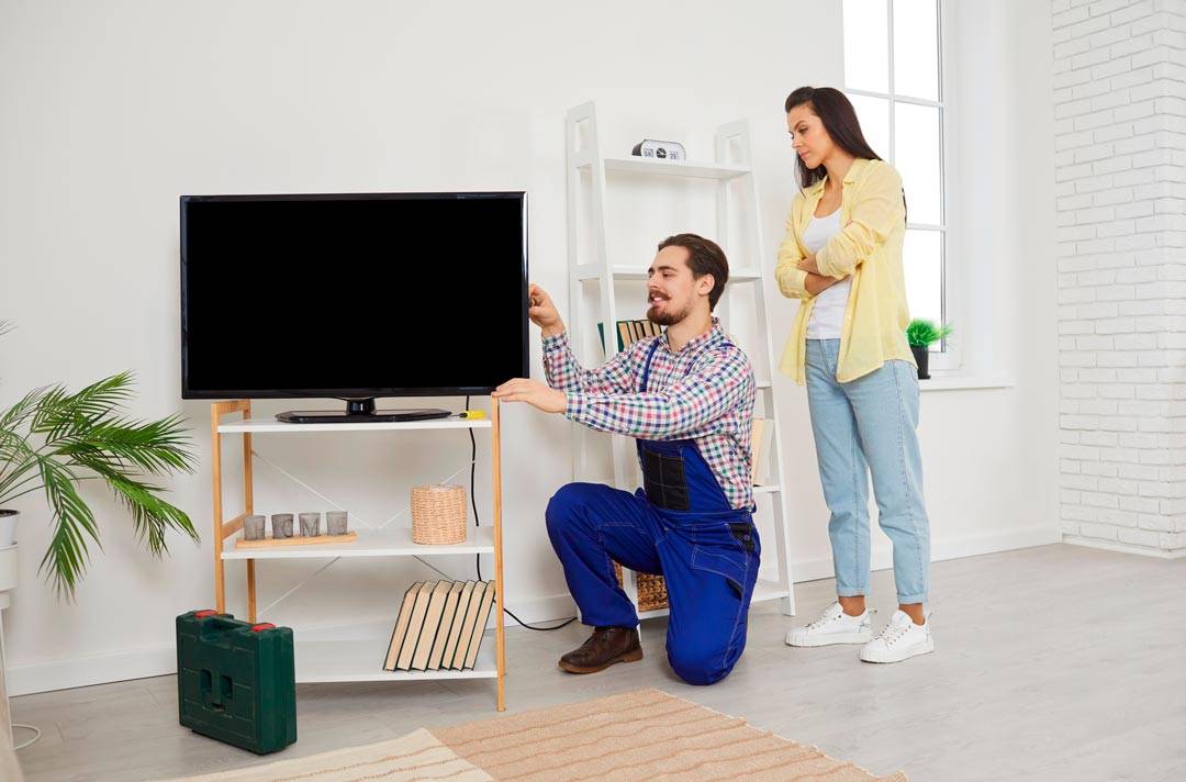 Você sabe a altura certa para instalar a TV?